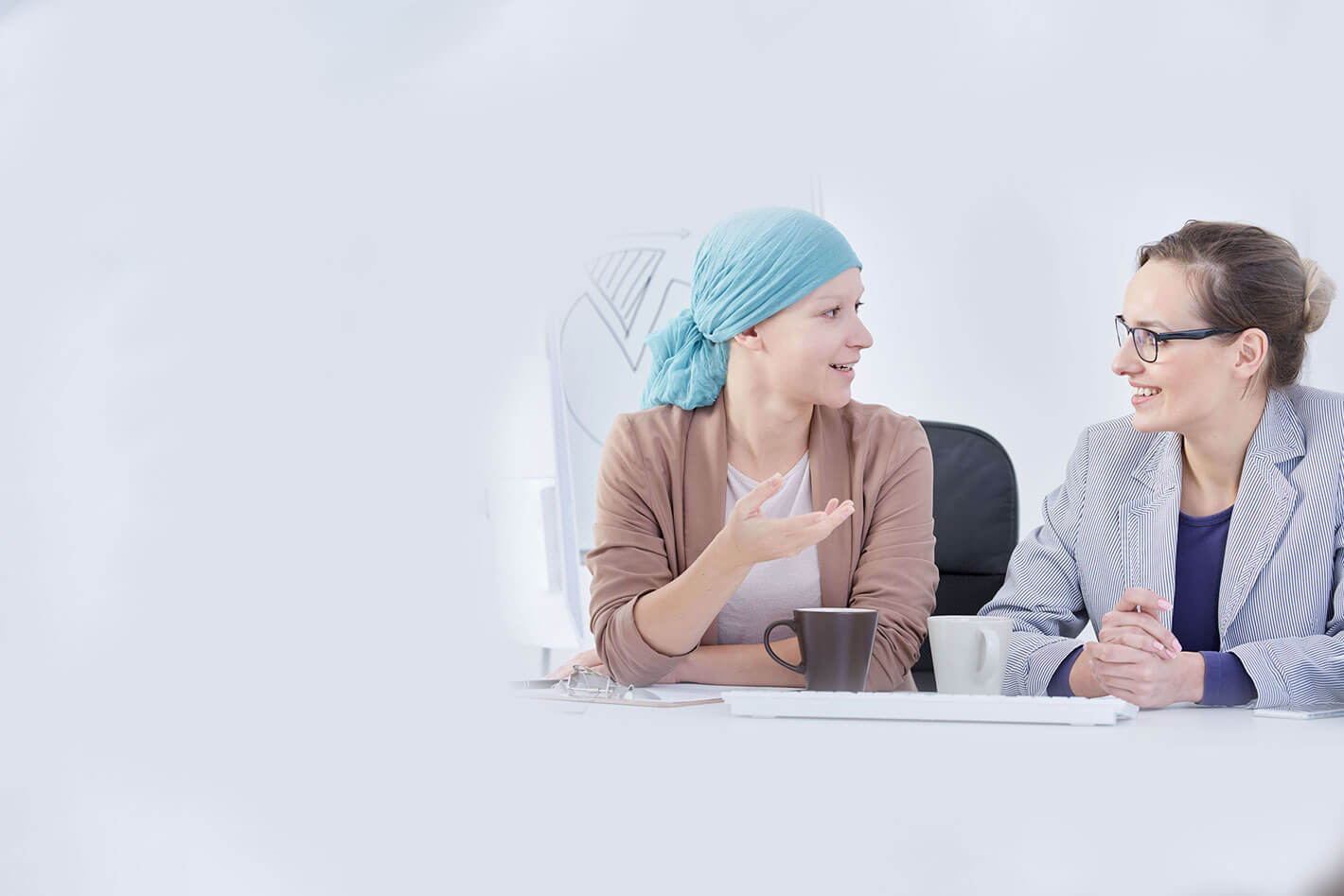 patient-talking-to-her-doctor